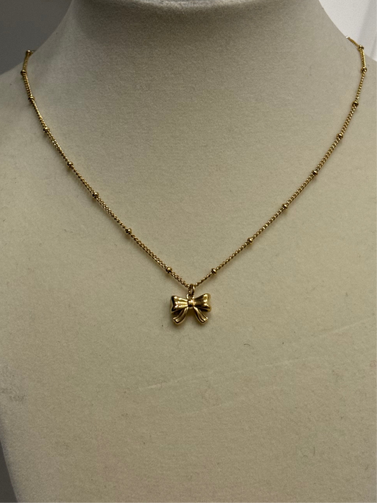 Minimalist gold bow necklace